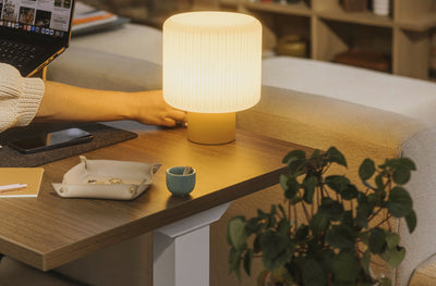 Perk Height-Adjustable Desk in lifestyle shot