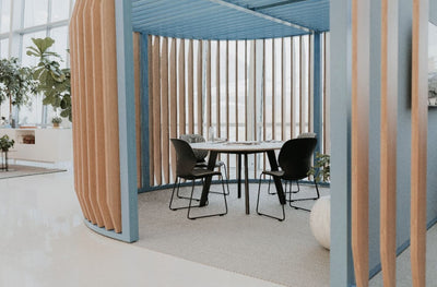 Immerse Round Table in lifestyle shot