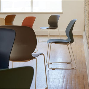 Maari Upholstered Chair with Sled Base in lifestyle shot