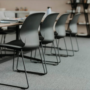 Maari Upholstered Chair with Sled Base in lifestyle shot