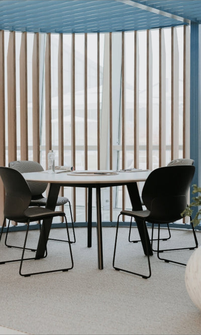 Maari Upholstered Chair with Sled Base in lifestyle shot