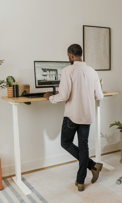 Upside Sit-to-Stand Desk in lifestyle shot