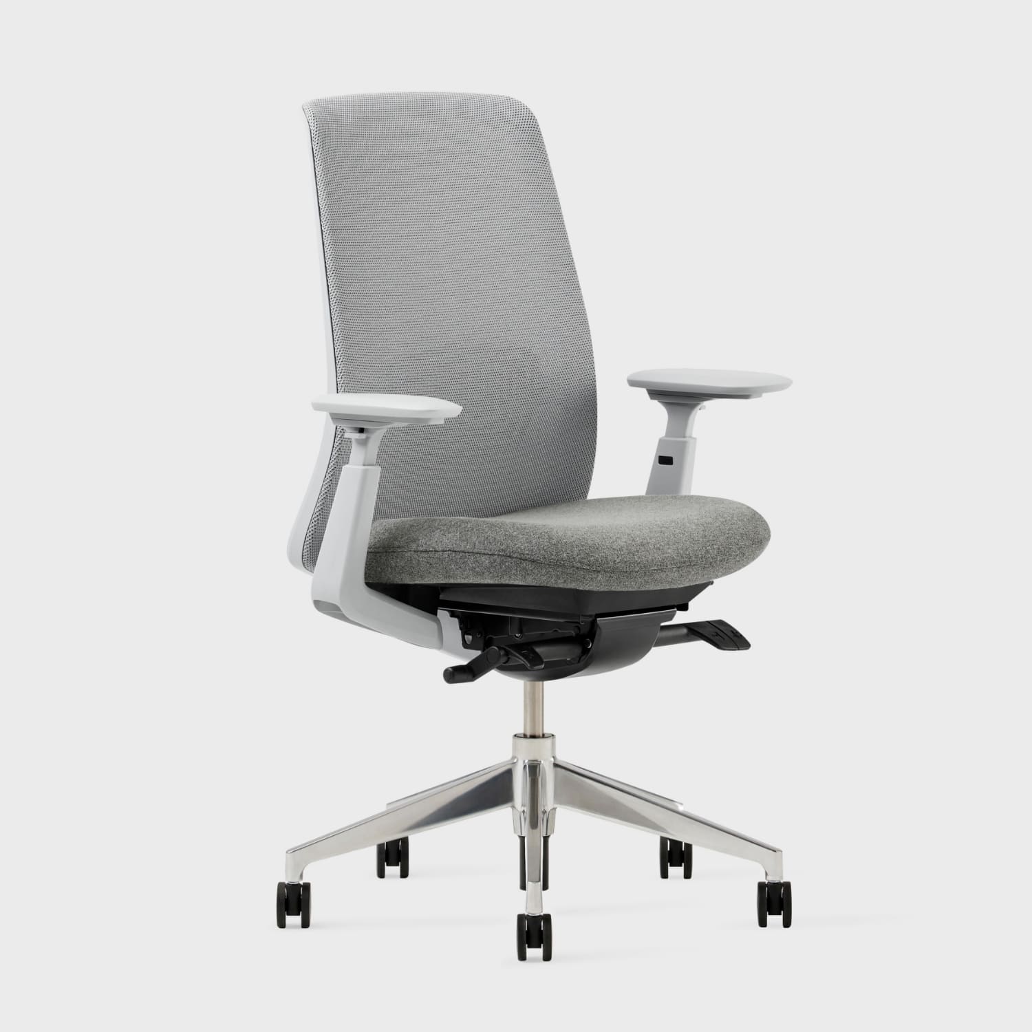 Soji Mesh Office Chair in gray fabric with adjustable armrests and ergonomic design for comfortable office seating.